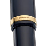 Hallmarked gold band close-up on the Pol Roger pen